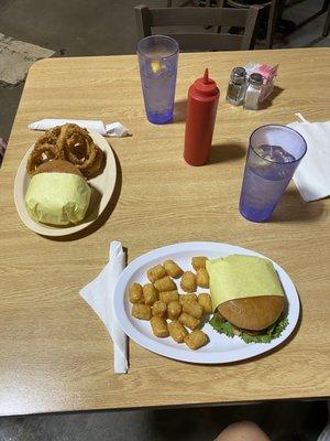 Mushroom Swiss Burger & onion rings, catfish sandwich & tater tots.