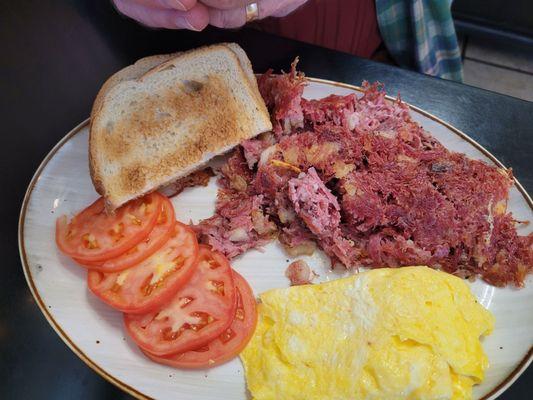 Corned beef hash and toast and omelet.