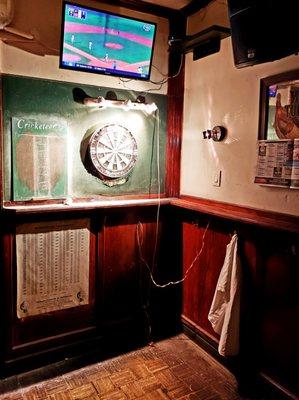 Play darts while watching the Mets