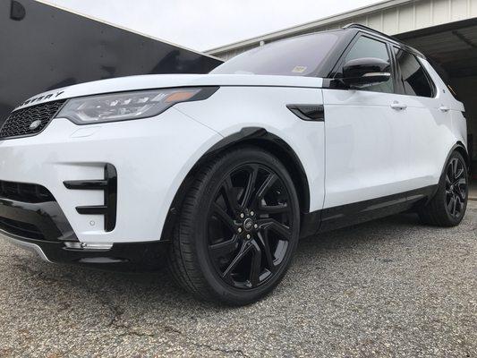 Brand new rover discovery. Paint corrected then ceramic coated and wheels blacked out!