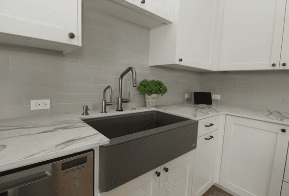 Beautiful, full kitchen remodel by Nelson Tile and Stone. Counters, tile, appliances, fixtures and floors.