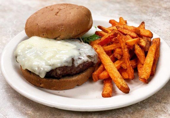 Brewster burger with Swiss cheese on wheat bun with sweet potato fries