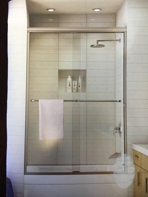 Sliding shower glass