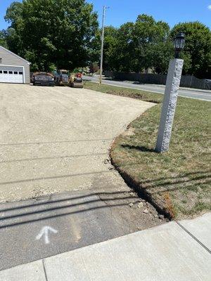 Opened up old driveway filled in what was needed for sub base and straightened out the edges