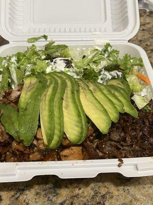 Chicken and beef teriyaki plate with avocado