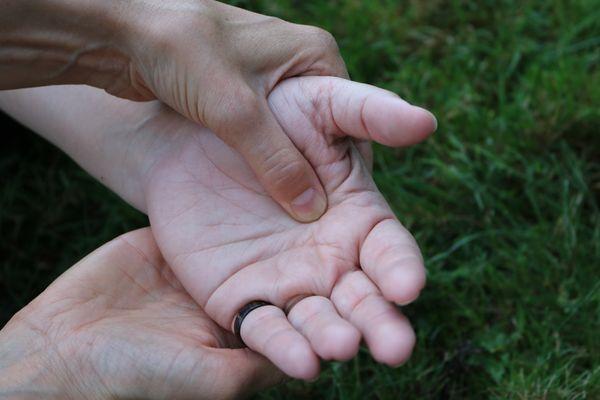 Acupressure to relieve stress and help digestion.