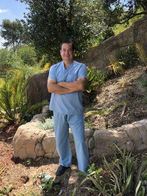 Medical Director, Dr. Ginsburg, in the garden.