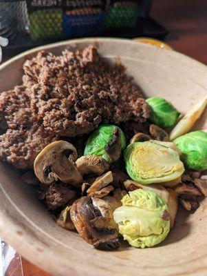 Bison bowl with mushrooms brussel sprouts and potatoes