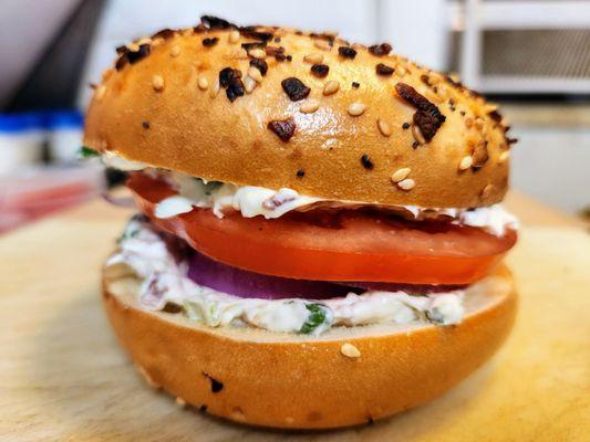 House made bacon scallion cream cheese with tomato and onion.