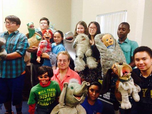 At a show for teens, some audience members pose with SOME of the puppets in Joe's one hour show.