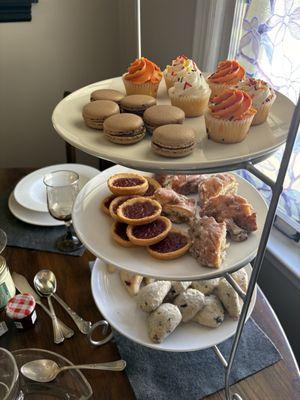 Jam and clotted cream (left). Top: macarons. Middle: raspberry tartlets Other items shown not from World Market