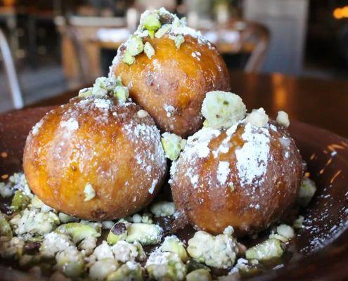 Our in-house pastry Chef, Kate Holowchik, creates the most beautiful and delicious desserts. Say hello to her cannoli zeppoles.