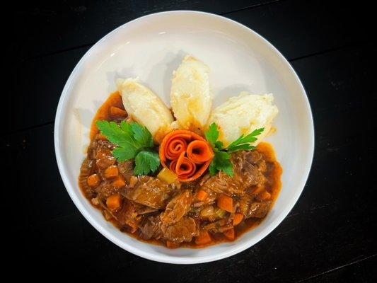 Bourbon red wine Beef bourguignon with asiago mashed potatoes