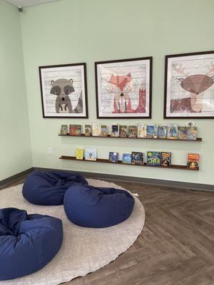 Waiting area - cozy seating and lots of children's books