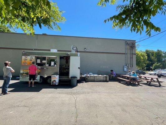 Taco truck and eating area