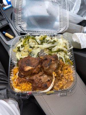 Jerk chicken, yollof rice and mixed greens