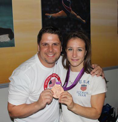 Dr. Francis Celebrating with USA  Olympian Marty Malloy at the USA House in London after winning the Bronze Medal!