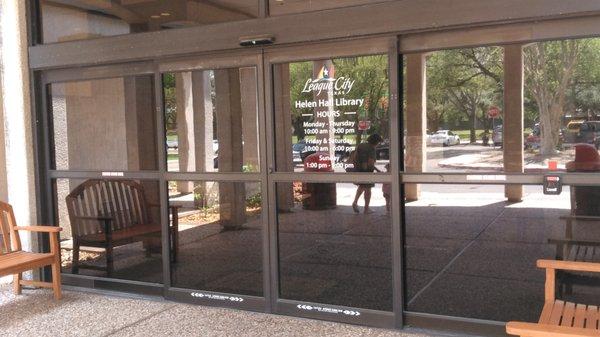 This is the main entrance showing the hours - it's the only library in Galveston County that has Sunday hours.