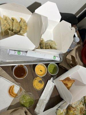 Steamed and pan fried veggie Nepalese dumplings and an order of samosas.