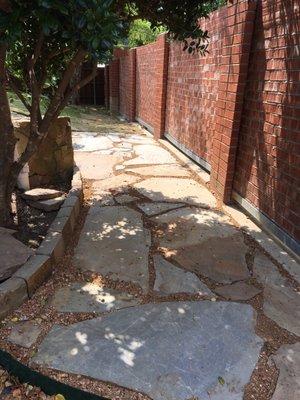 Flagstone walkway to back yard