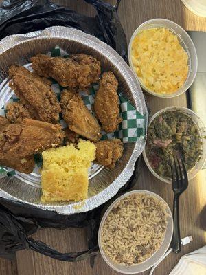 Chicken wings, collard greens, macaroni and cheese, dirty rice.