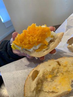 Bagel with egg whites and cheddar