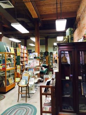 As you'd expect for a place that sells old books -- organization is there, but so are piles and stacks of stuff everywhere!