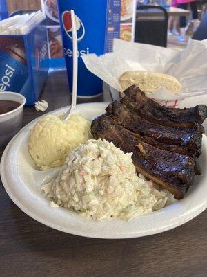 Ribs with coleslaw and potato salad.