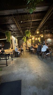 Indoor space with wooden benches and tables