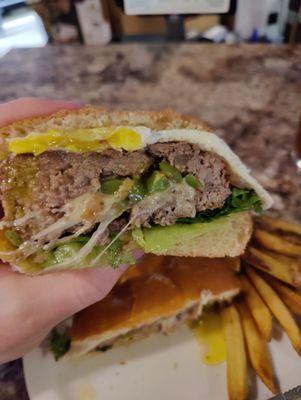 Cheese, onions, and peppers, all in the fresh made burgers.