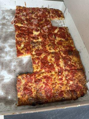 Party tray of pizza, half pepperoni/ham, half cheese. Food for the end of the school year block party for the neighborhood kids!