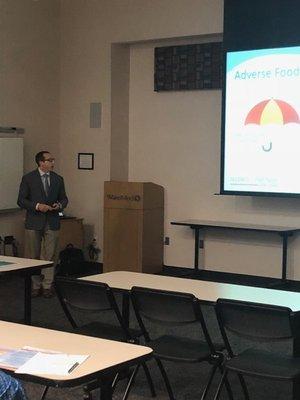 Dr. Jonathan Romeo speaking to a group of Celiac patients