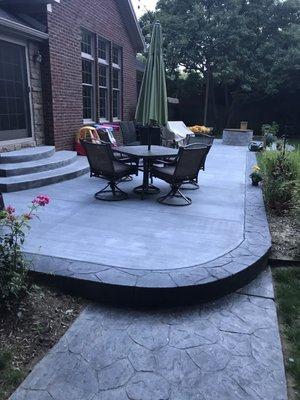 Patio, notice the steps from the sliding glass door.