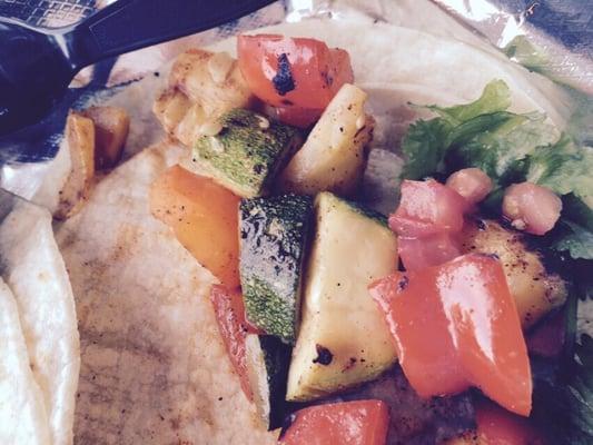 Veggie taco full of flavor with squash, zucchini and peppers