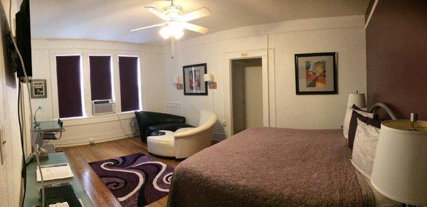 Room 9: Comfy king bed, seating area and desk, full kitchen and nice bathroom