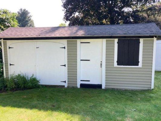 Our handyman traveled to Andover, MA to paint three sheds for this
residence.