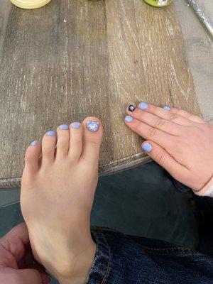 My baby girl got winter nails! Full on mani pedi and her cuticles look great!