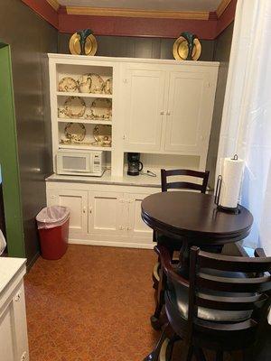 Other end of kitchen. Silverware, coffee, toaster, etc in cabinet