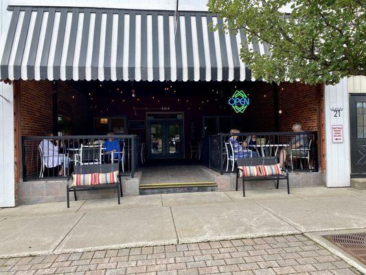 Good street parking with large covered patio in front