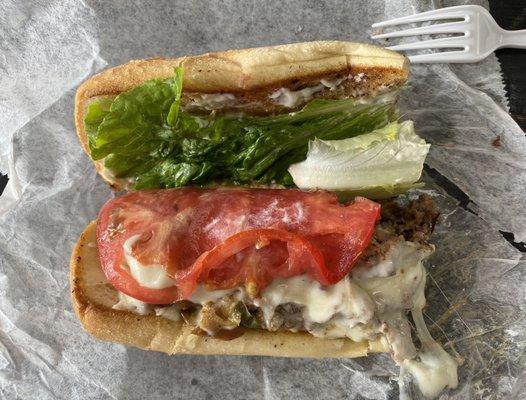 Philly Cheesesteak -- my half of our 12" sub. With grilled onions and peppers, lettuce, tomatoes, and mayo.