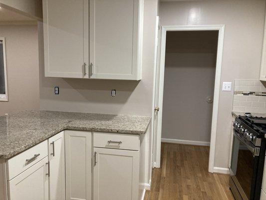 Colada cabinets; Giallo Ornamental granite countertop