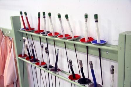 Rack of fencing foils waiting for action at Rockville Fencing Academy