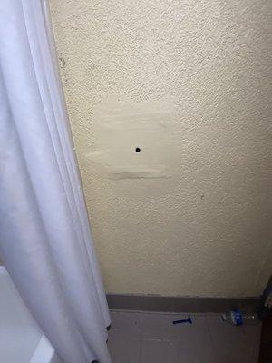 Large hole across from Toilet and could possibly be a camara watching!!