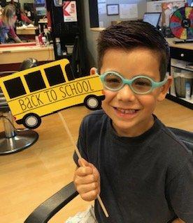 Someone seems happy with their new back to school haircut!