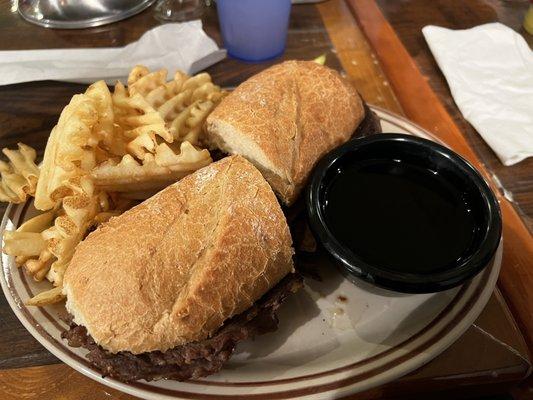 French dip with au jus and waffle fries