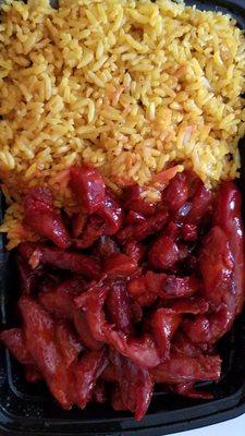 Boneless BBQ spareribs dinner combo with (quite yellow) fried rice. Okay but not the greatest.