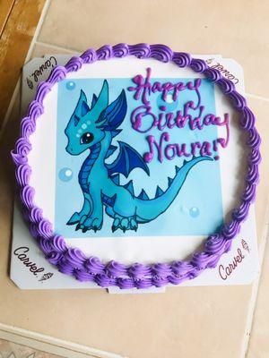 Birthday cake for my daughters 9th birthday. She's picked this picture of a dragon from a google image search. It turned out beautiful.