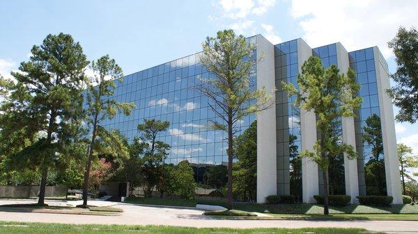 One of the visitor parking and entrances on Pinegate Dr.