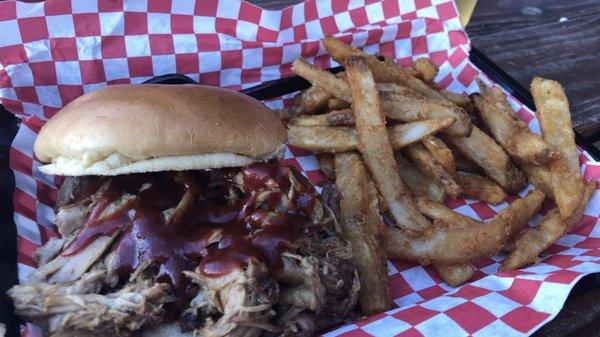 Pulled pork sandwich and fries