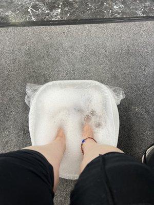 No frills bucket pedicure- does the job.  No chair massage spa or foot whirlpool- just the basics here.